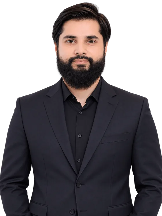 Asad Mahmood, in a dark jacket